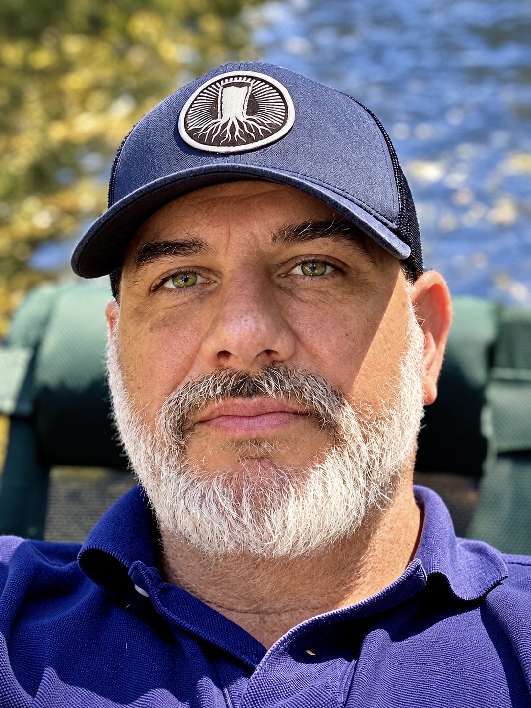 Sean D. Leit outdoors wearing a blue cap